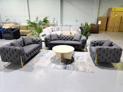 DIORA dark blue and black boucle Chesterfield 3+2+1 sofa set with gold legs, showroom view