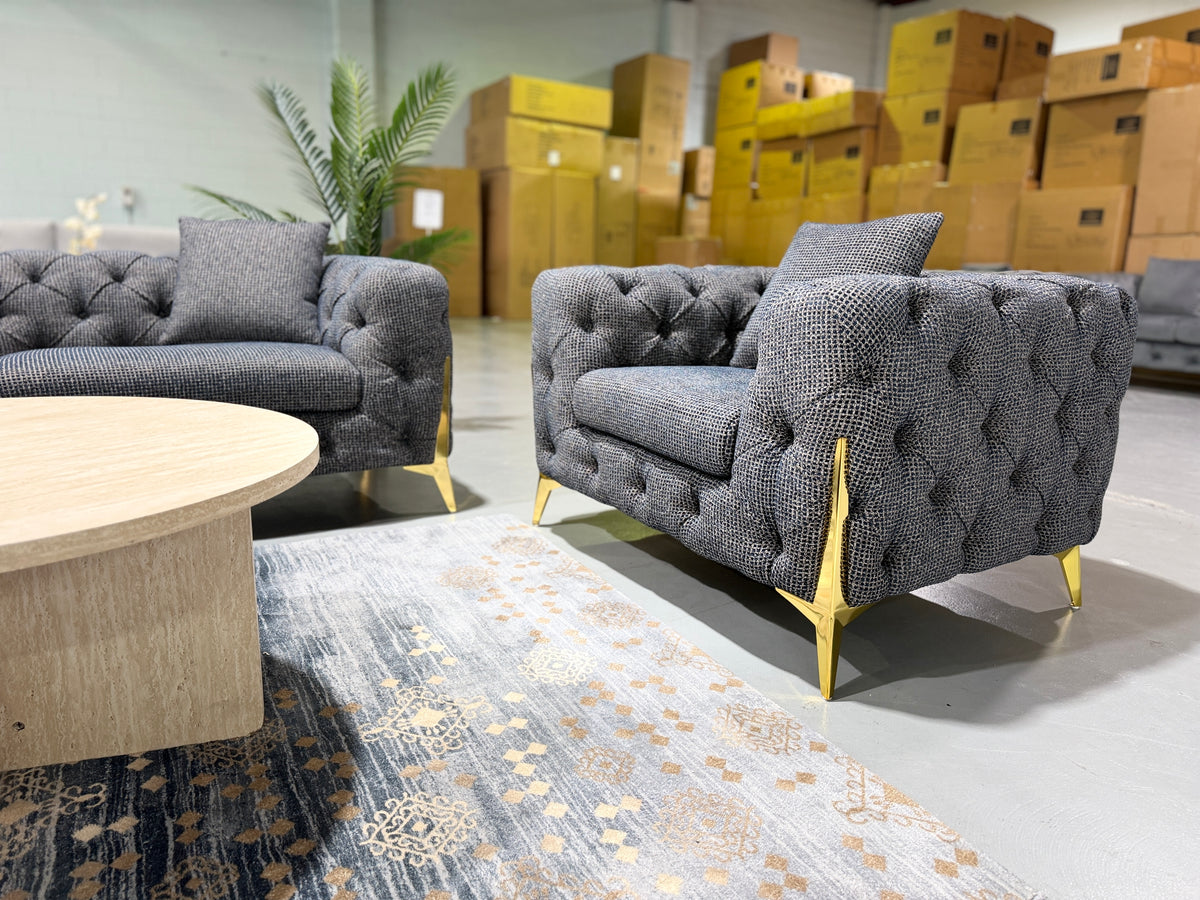 DIORA boucle Chesterfield armchair with gold legs