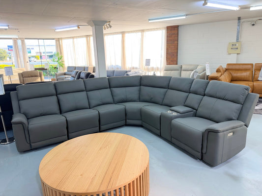 HIWA grey Capri leather electric recliner corner lounge suite on the floor at our Coopers Plains showroom