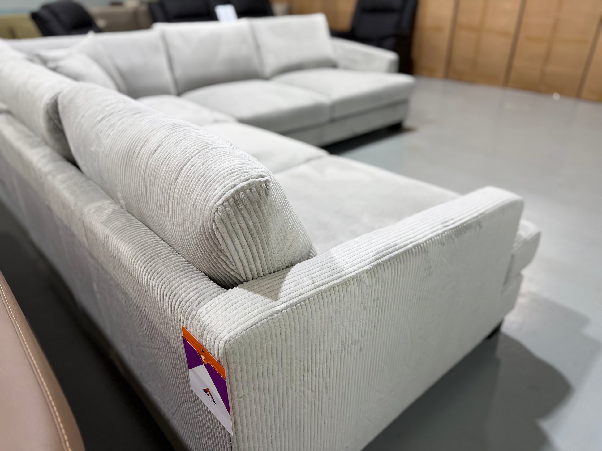 ORION corner lounge with scatter cushions, angled view